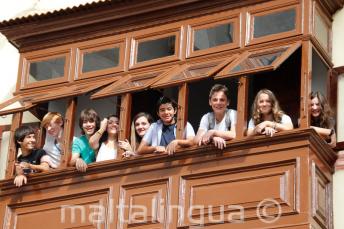 Teen students on a school balcony