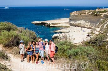 English students visiting St Peter's Pool, Malta
