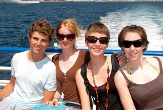 A family enjoying a language school boat trip