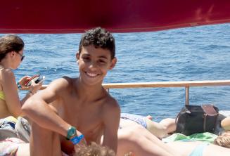 A kids programme student on a school boat trip
