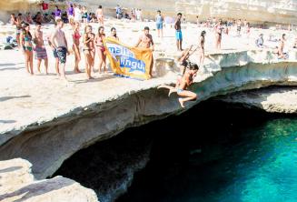 Maltalingua School of English jumping into St Peter's Pool