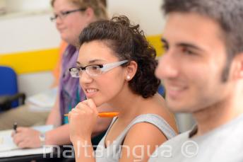 A student listening intently