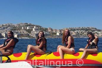4 girls on a banana boat ride