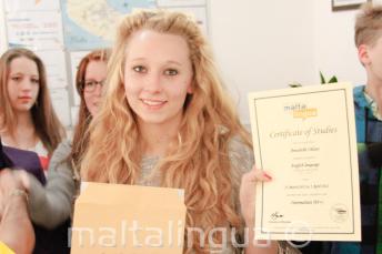 Junior language student with her English course certificate