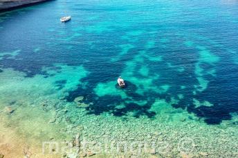 View of a bay in Malta with clear aquamarine water