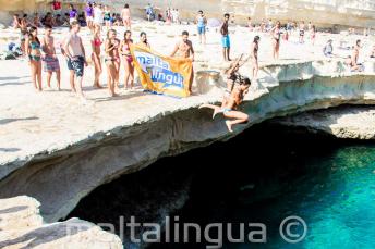 Maltalingua School of English jumping into St Peter's Pool