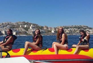 4 girls on a banana boat ride