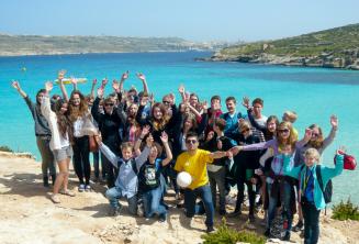 A group of language camp students on a trip to Comino, Malta