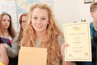 Junior language student with her English course certificate