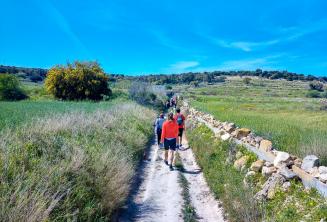 A group of English students walking through the countryside in Malta